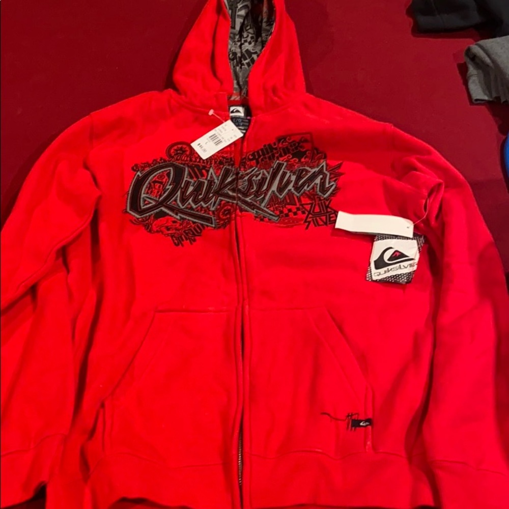 Red quiksilver zip up. Never worn
